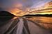National Geographic - A Jet Boat Leaves a Wake in the Mackenzie River at Sunset Peel and Stick Wall Decal by Wallmonkeys