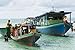 National Geographic - Bajau Sea Gypsy Houseboats on Dinawan Island Peel and Stick Wall Decal by Wallmonkeys